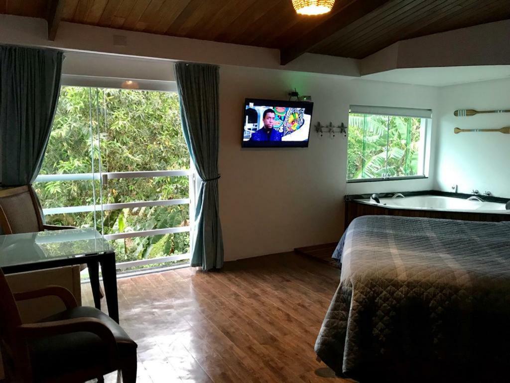 Suites Na Casa Da Praia Ilhabela Bagian luar foto